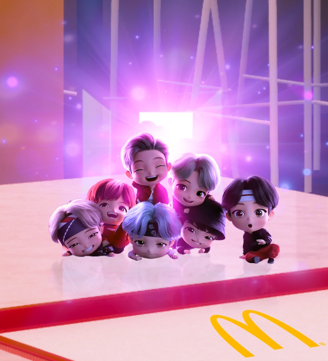 TinyTAN gathered on a McDonald's restaurant table with a glowing purple magic door behind them